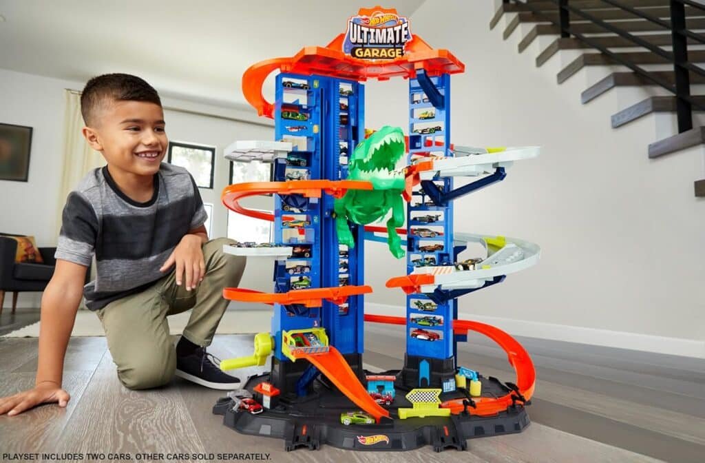 Hot Wheels City Toy Car Track Set, Ultimate Garage with T-Rex Dinosaur, Store 100+ 1:64 Scale Vehicles, 3-ft Tall, with 2 Cars (Amazon Exclusive)